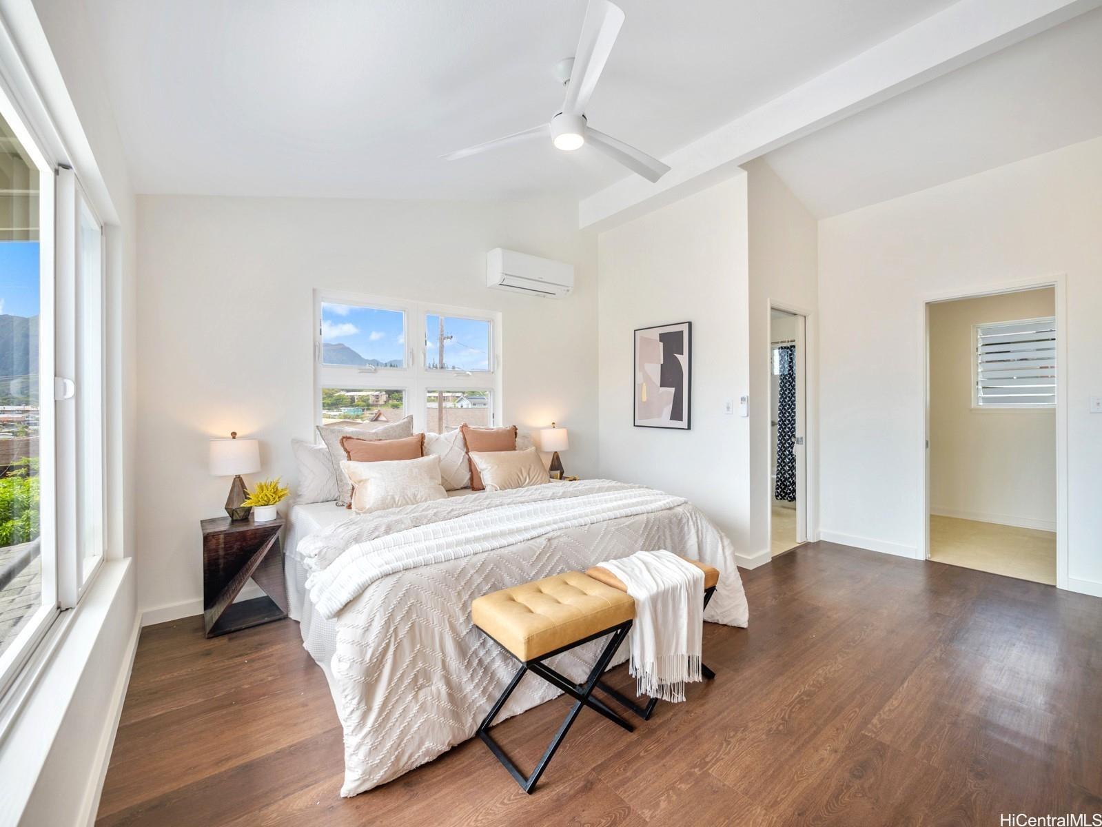 45-185 Lilipuna Road, Unit A Kaneohe, HI 96744 - Photo 8 of 22 a bed room with a bed and a chair