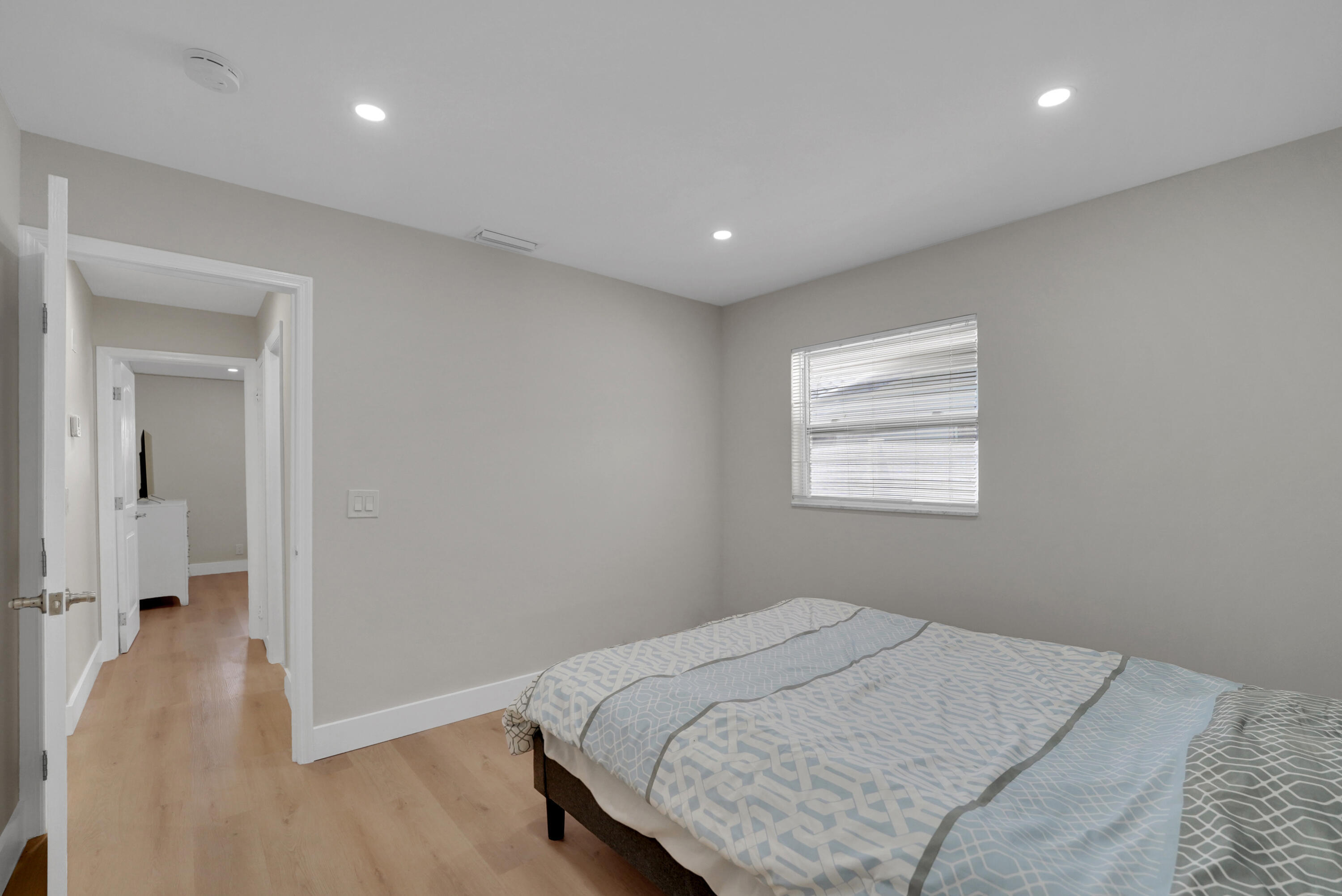 600 Northwest 12th Avenue Boca Raton, FL 33486 - Photo 36 of 63 a bedroom with a bed and a window