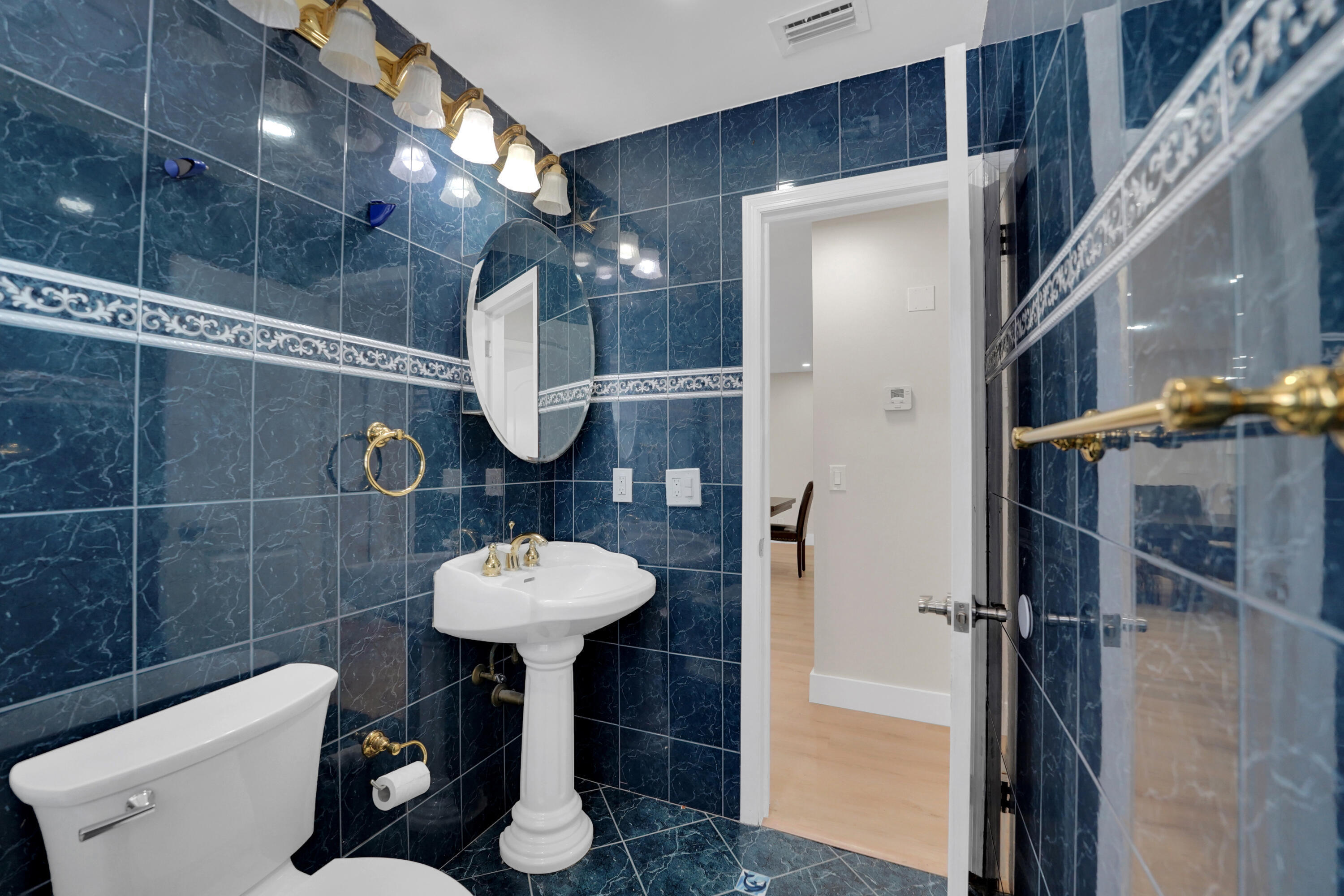 600 Northwest 12th Avenue Boca Raton, FL 33486 - Photo 39 of 63 a bathroom with a sink toilet and shower