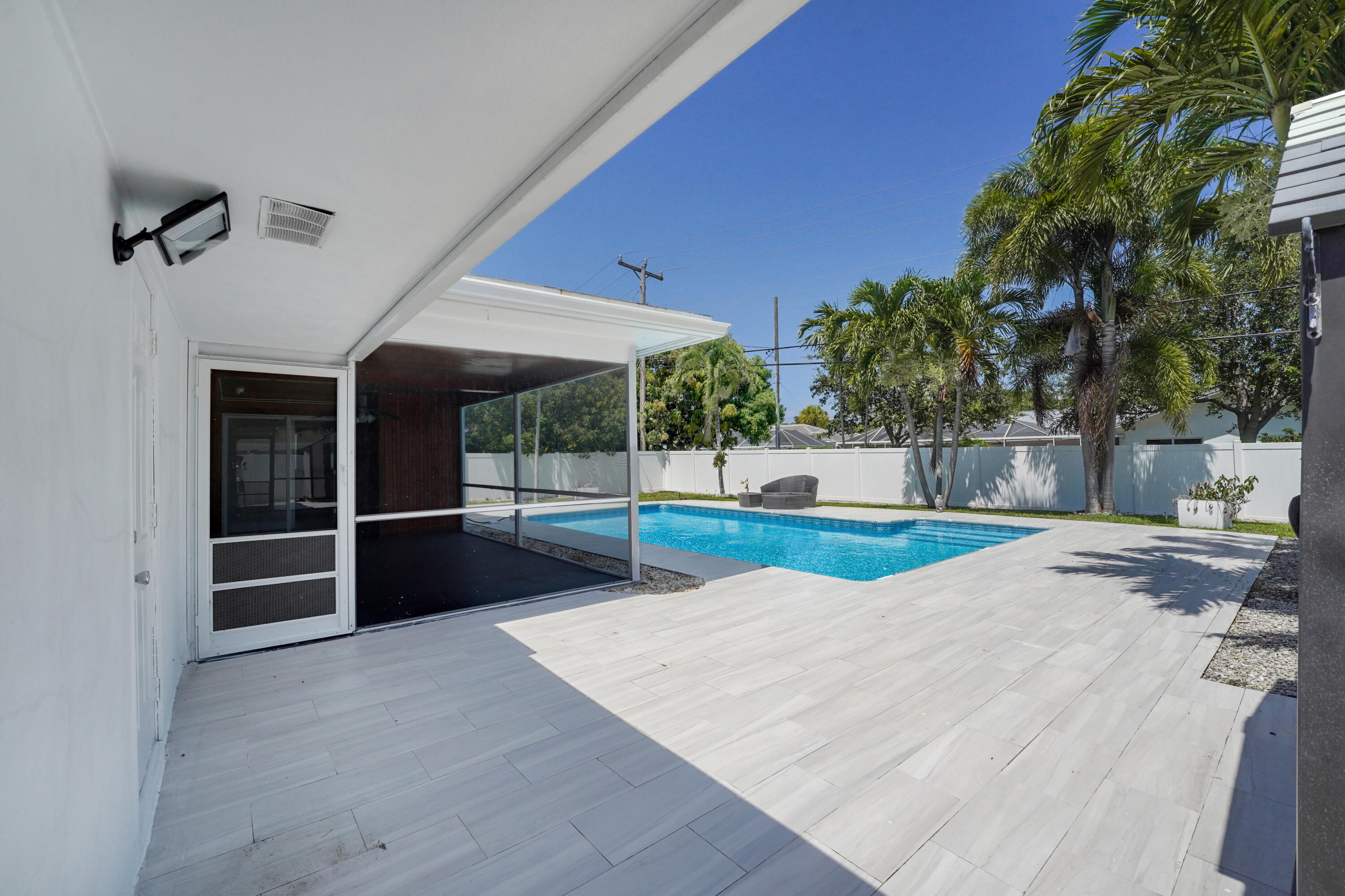 600 Northwest 12th Avenue Boca Raton, FL 33486 - Photo 49 of 63 a view of outdoor space with seating and kitchen view