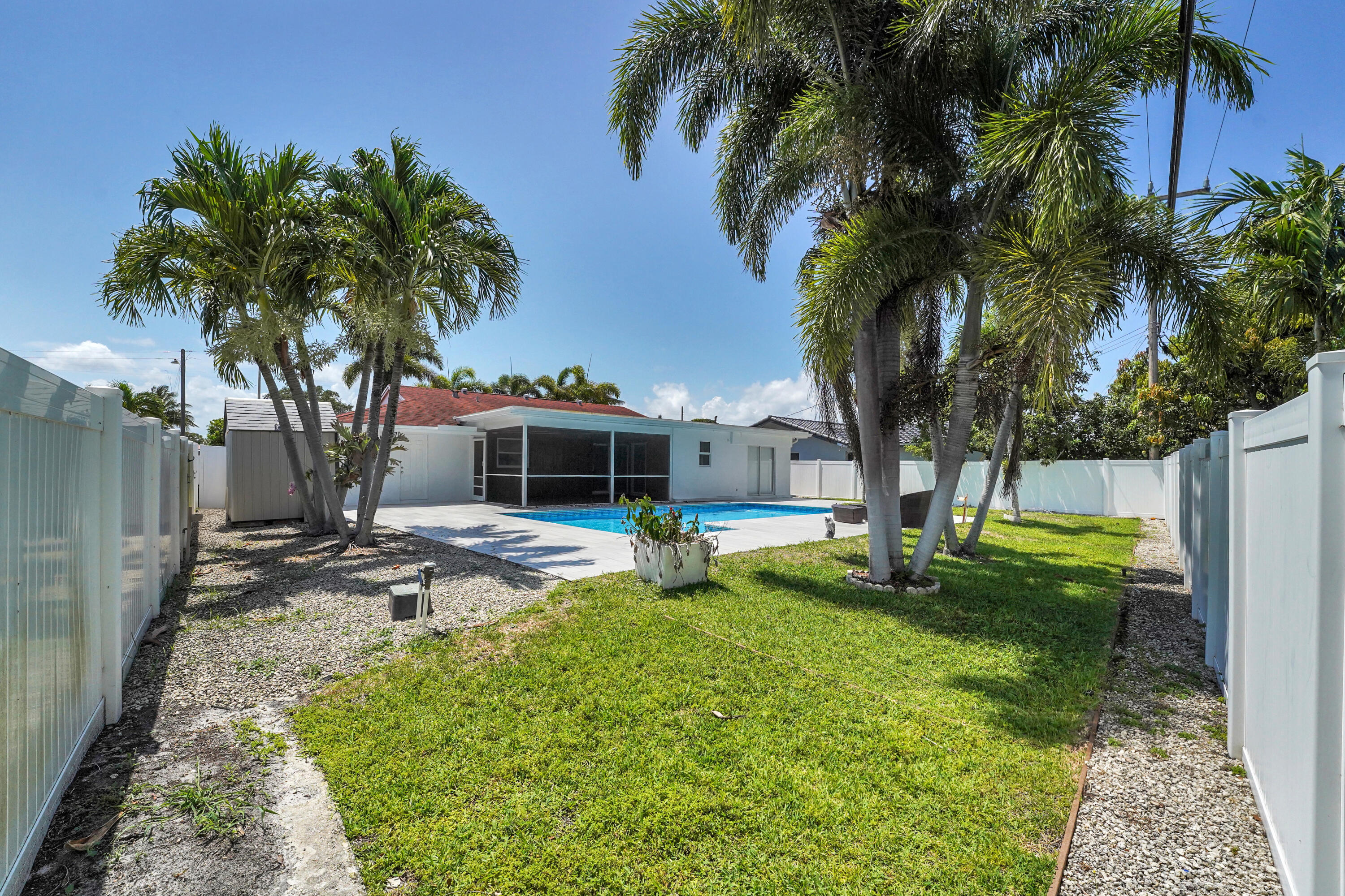 600 Northwest 12th Avenue Boca Raton, FL 33486 - Photo 51 of 63 a view of a house with swimming pool and sitting area