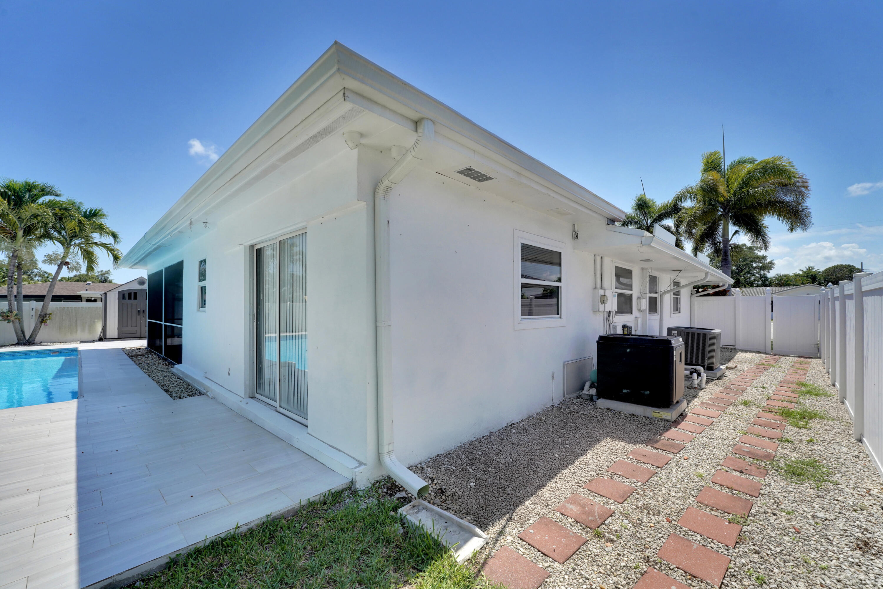 600 Northwest 12th Avenue Boca Raton, FL 33486 - Photo 56 of 63 a view of a house with a yard