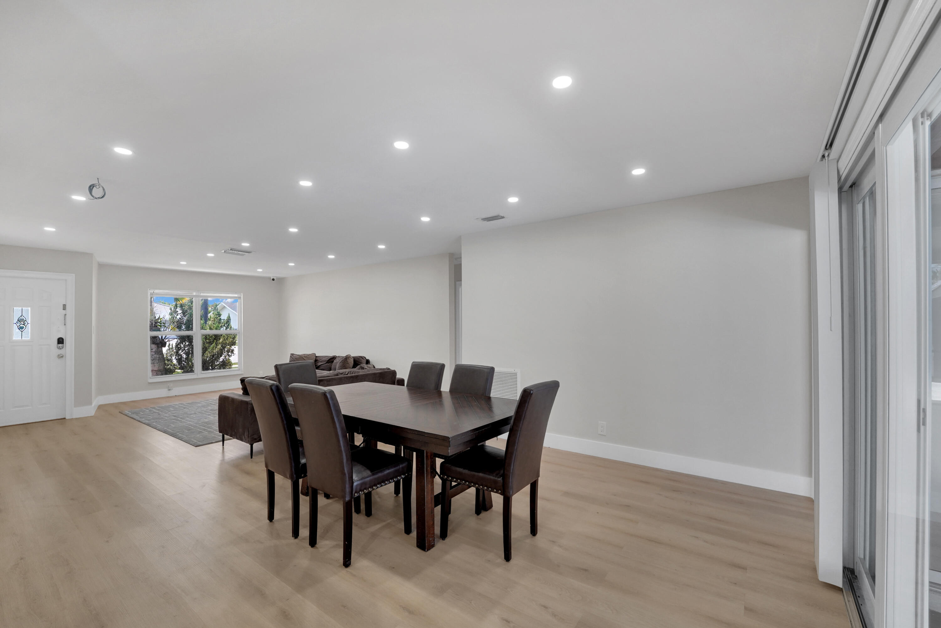 600 Northwest 12th Avenue Boca Raton, FL 33486 - Photo 9 of 63 a view of a dining room with furniture
