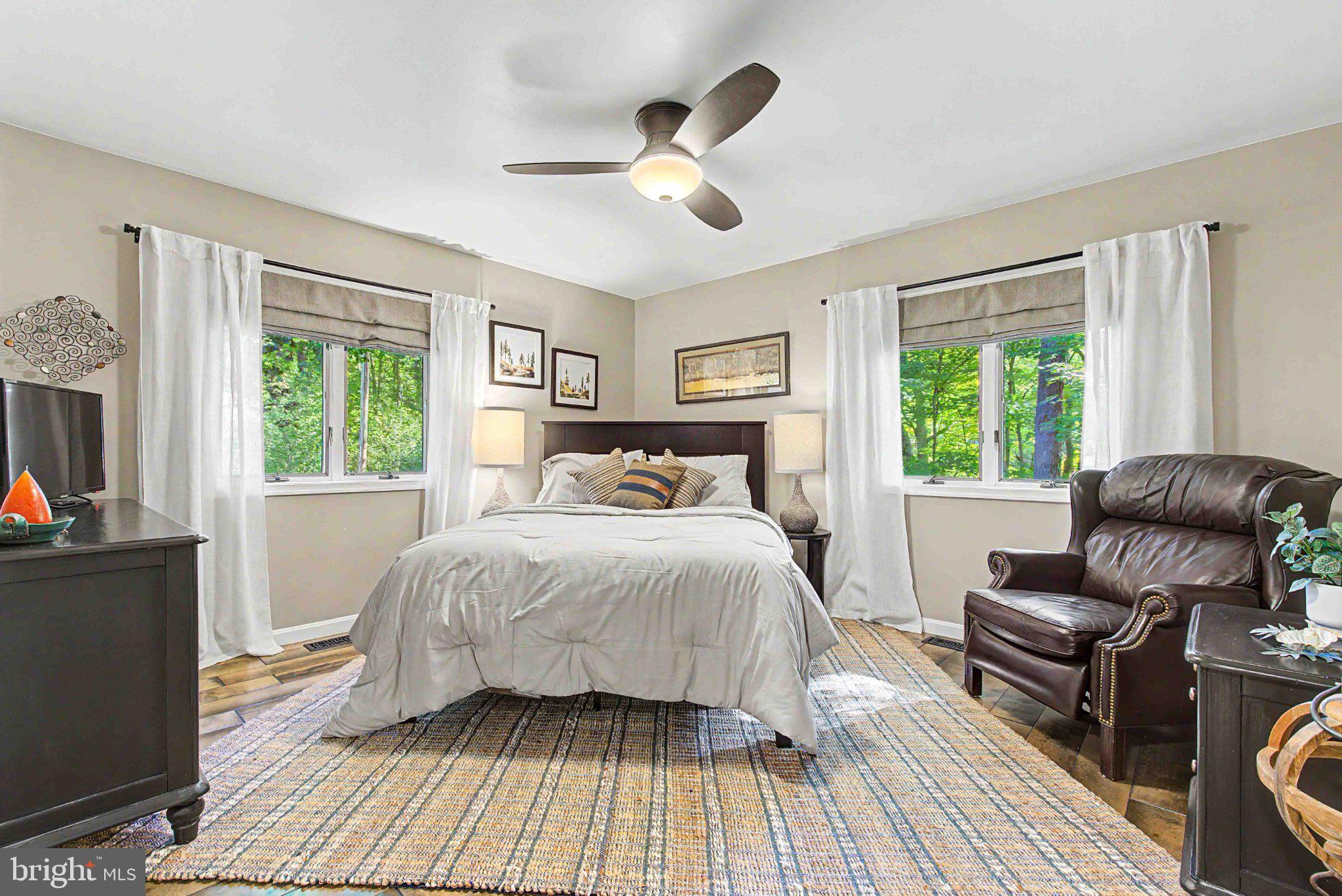 1001 Penn Point Road Oakland, MD 21550 - Photo 36 of 61 Serene bedroom with nature views.