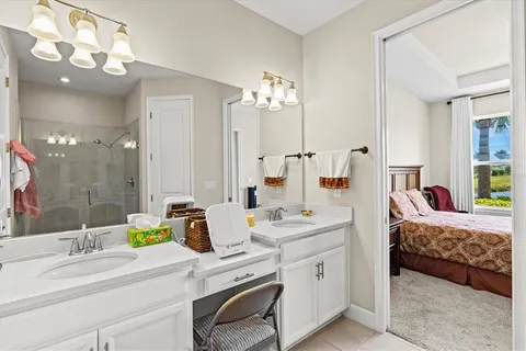 a bedroom with furniture and a window