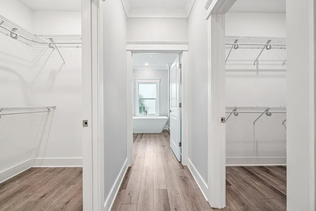 a view of a bathroom from a hallway