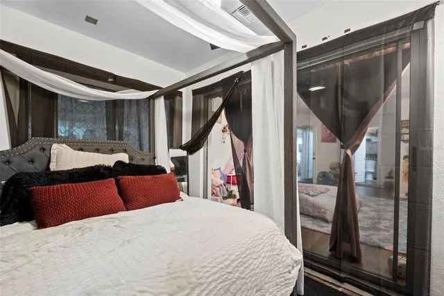 a living room with furniture flat screen tv and a fireplace