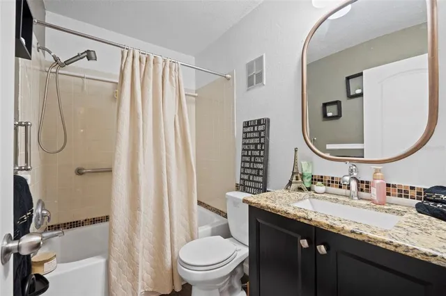a kitchen with a refrigerator sink and microwave