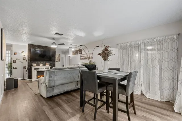 a patio with table and chairs