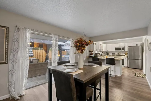 an aerial view of a house with a garden