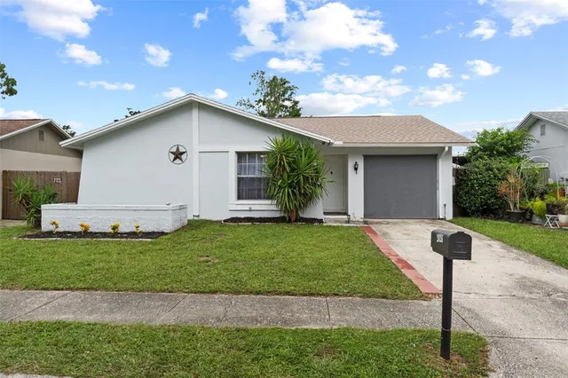 a front view of house with yard