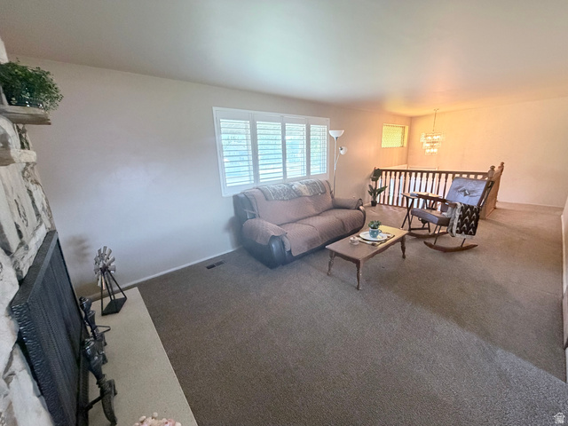 2298 West 800 North Clinton, UT 84015 - Photo 7 of 53 Living space featuring neutral wall tones and plush carpeting