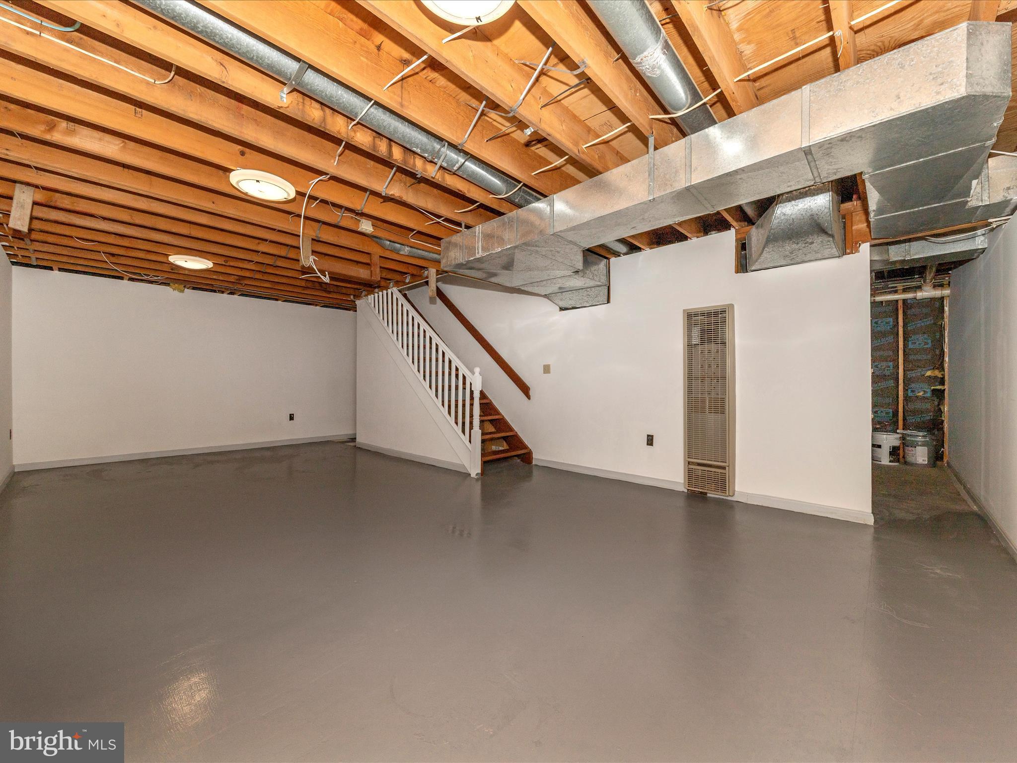 9513 Huntmaster Road Gaithersburg, MD 20882 - Photo 28 of 51 a view of a room with wooden walls