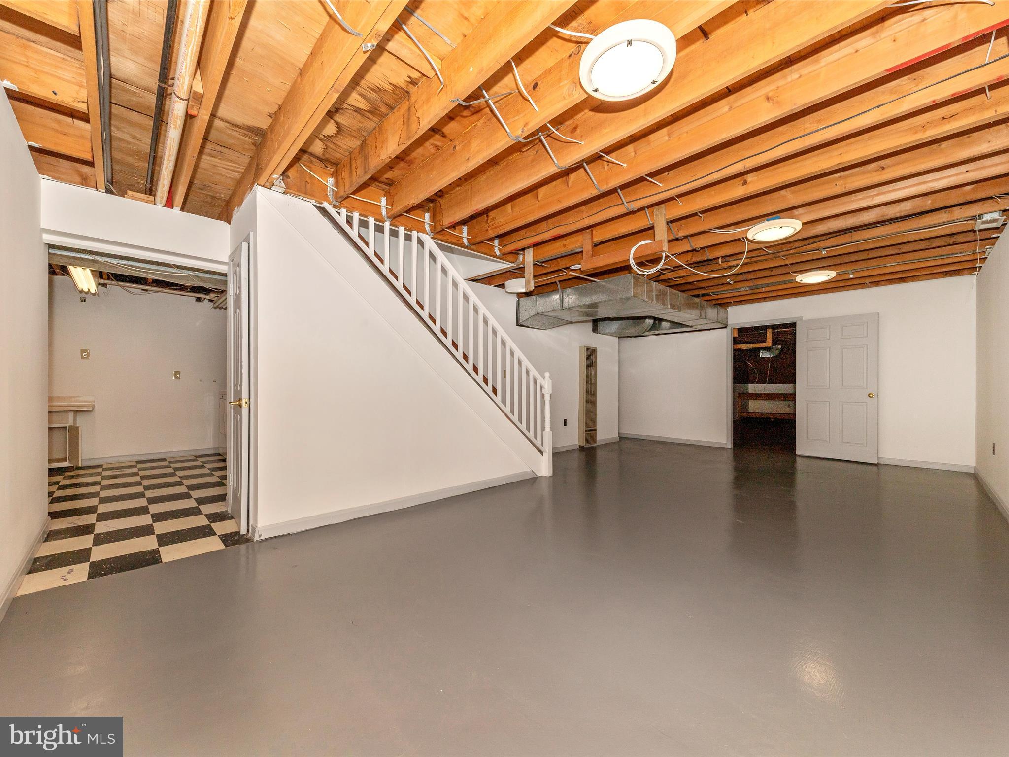 9513 Huntmaster Road Gaithersburg, MD 20882 - Photo 29 of 51 a view of a room with wooden walls