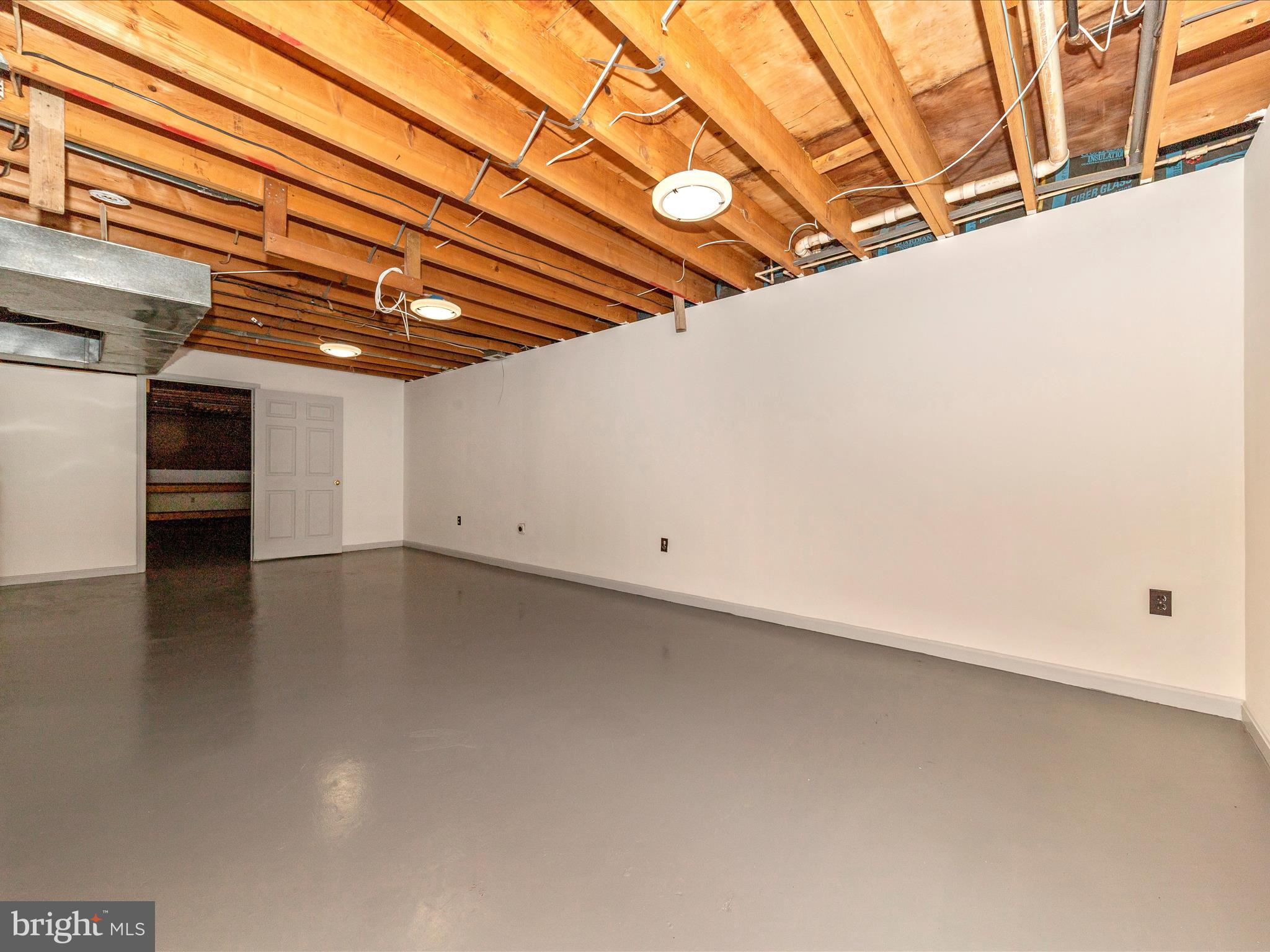9513 Huntmaster Road Gaithersburg, MD 20882 - Photo 30 of 51 a view of a room with an empty space