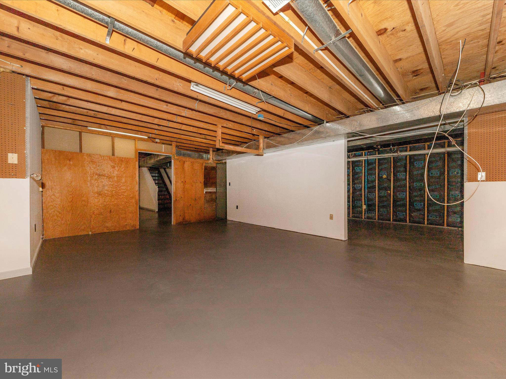 9513 Huntmaster Road Gaithersburg, MD 20882 - Photo 36 of 51 a view of a room with wooden walls