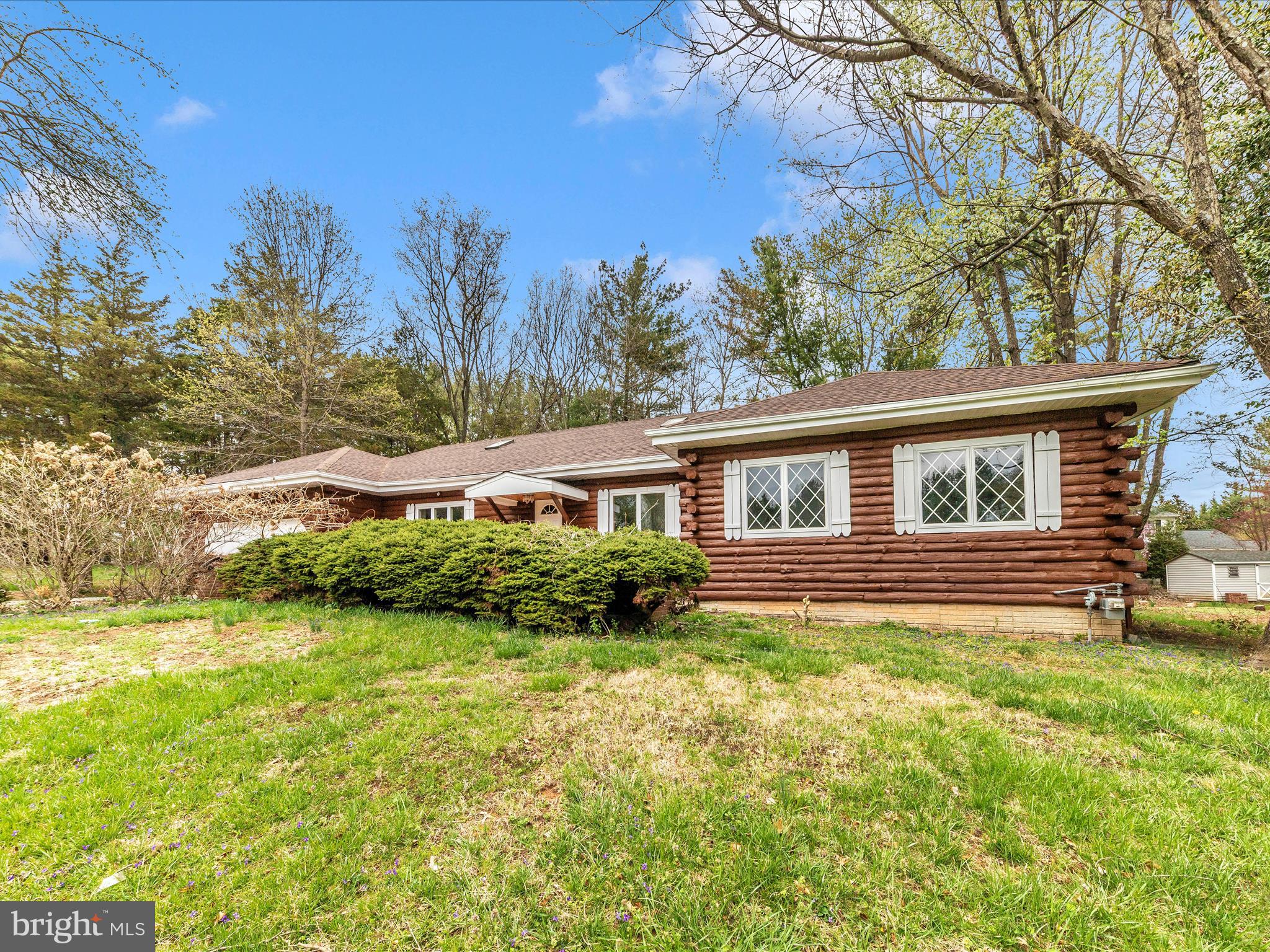 9513 Huntmaster Road Gaithersburg, MD 20882 - Photo 39 of 51 a view of a house with a yard