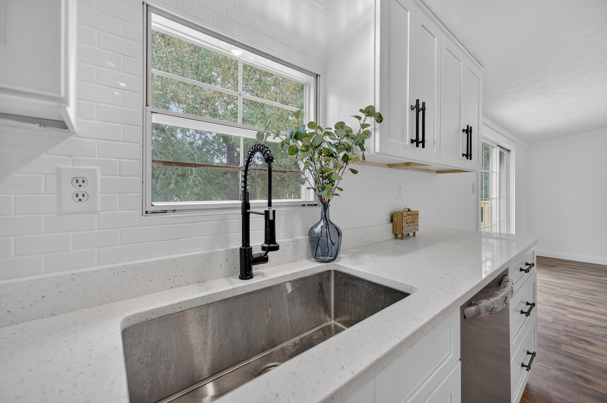 4580 Rainbird Rise Road Crestview, FL 32539 - Photo 14 of 41 a kitchen with a sink and a window