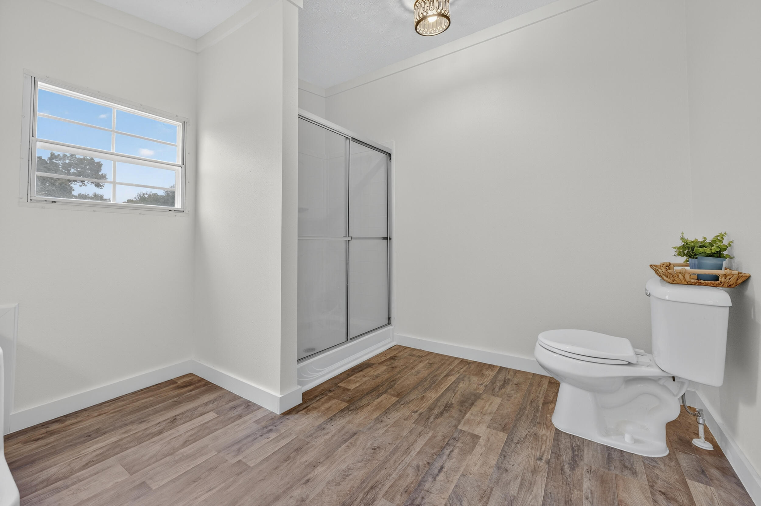4580 Rainbird Rise Road Crestview, FL 32539 - Photo 27 of 41 a bathroom with a toilet and a vanity