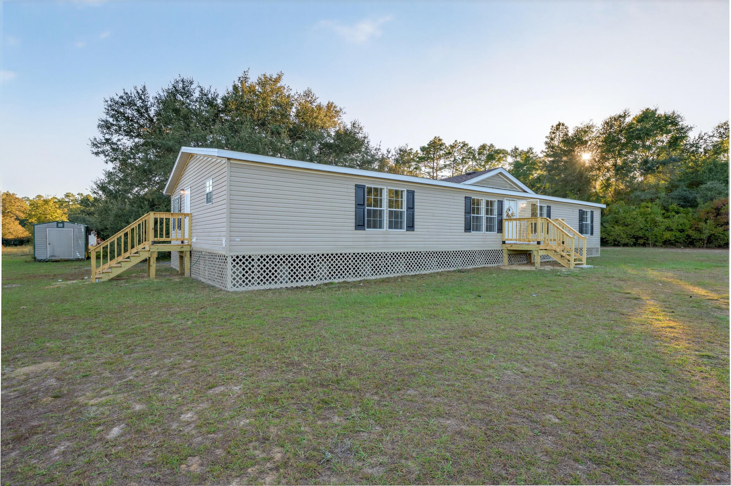 4580 Rainbird Rise Road Crestview, FL 32539 - Photo 3 of 41 a view of a house with a backyard