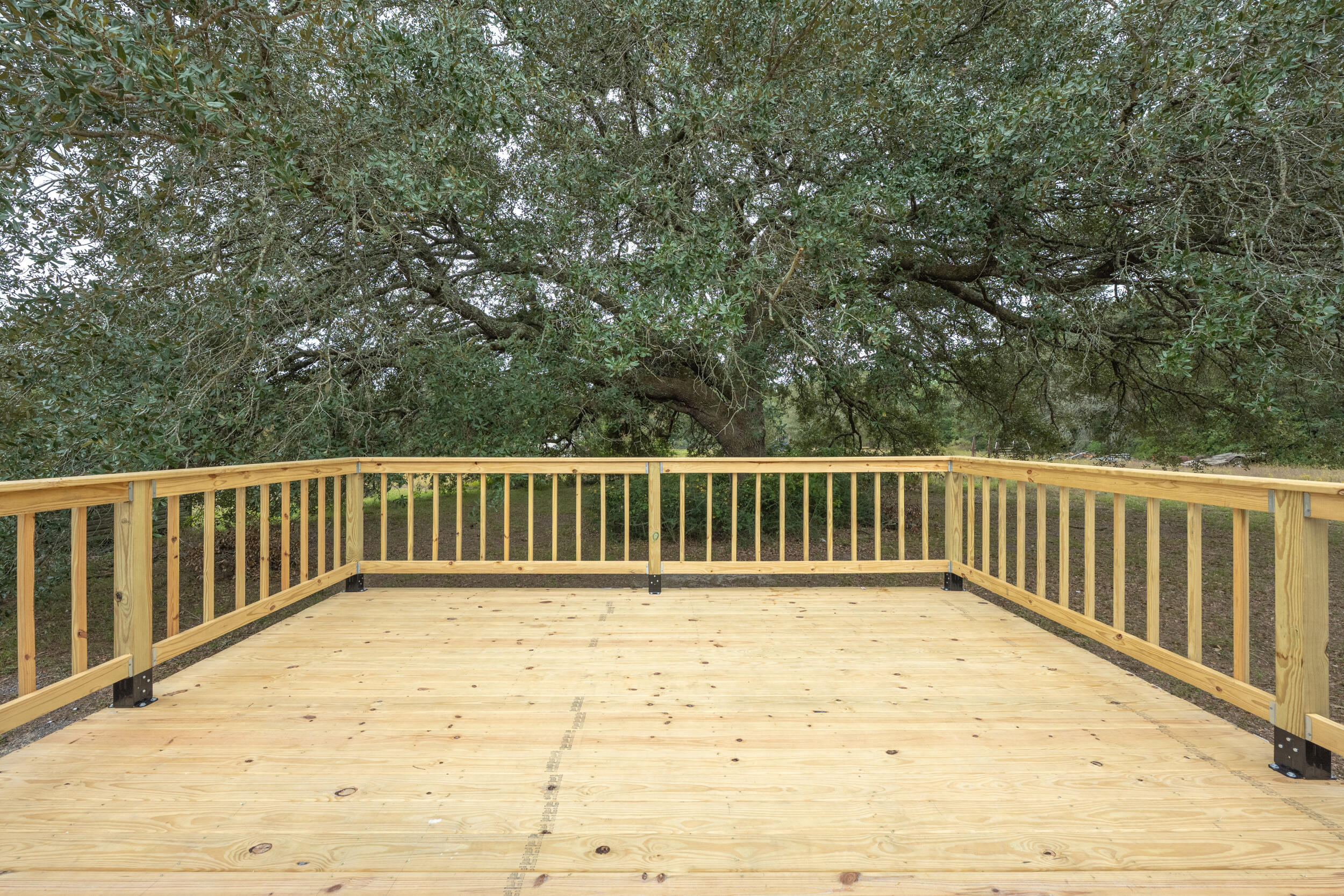 4580 Rainbird Rise Road Crestview, FL 32539 - Photo 40 of 41 a view of wooden balcony