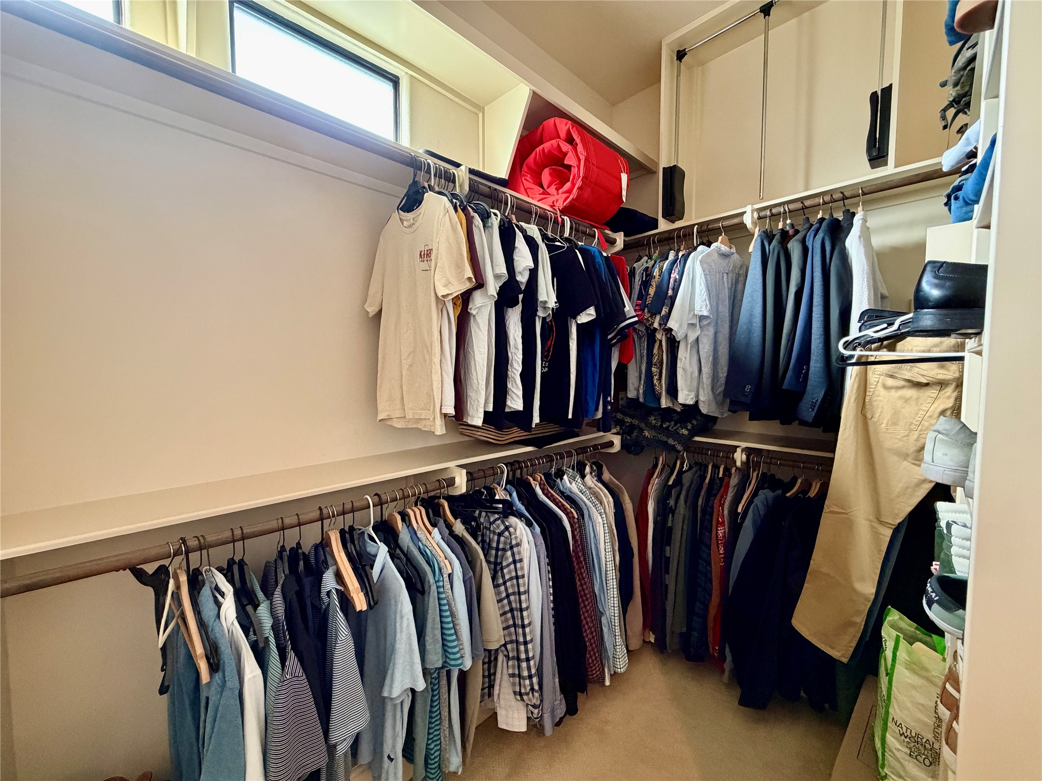 508 Knox Street Houston, TX 77007 - Photo 19 of 25 a view of walk in closet with clothes