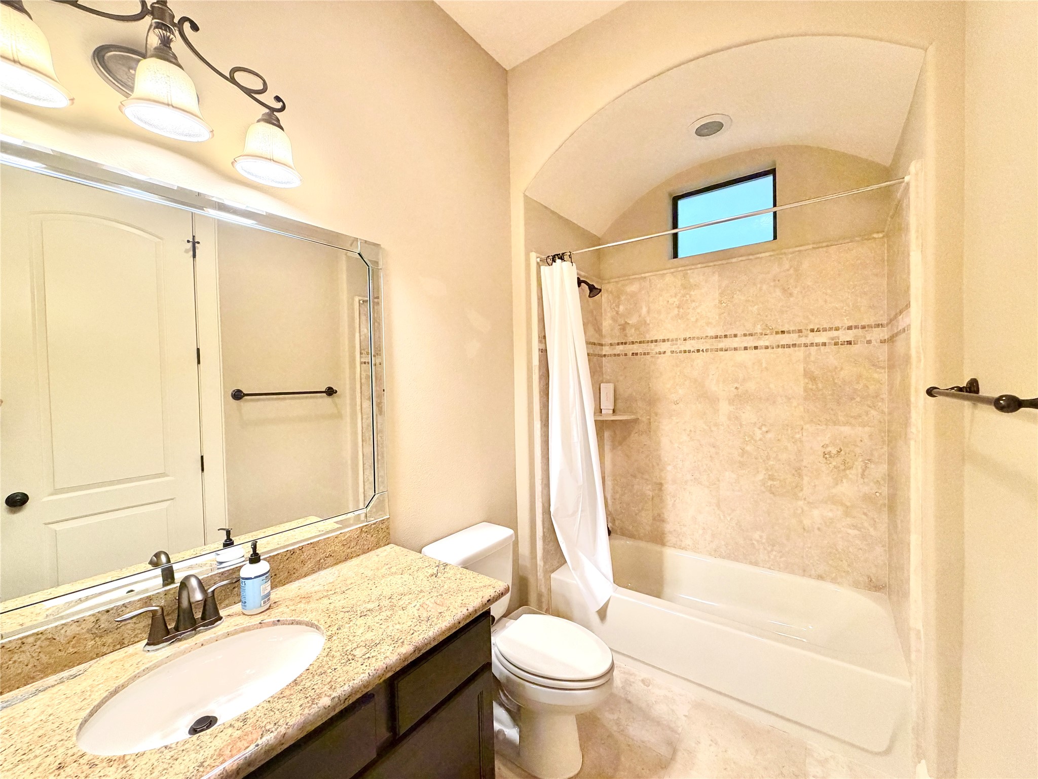 508 Knox Street Houston, TX 77007 - Photo 5 of 25 a bathroom with a granite countertop sink toilet and shower