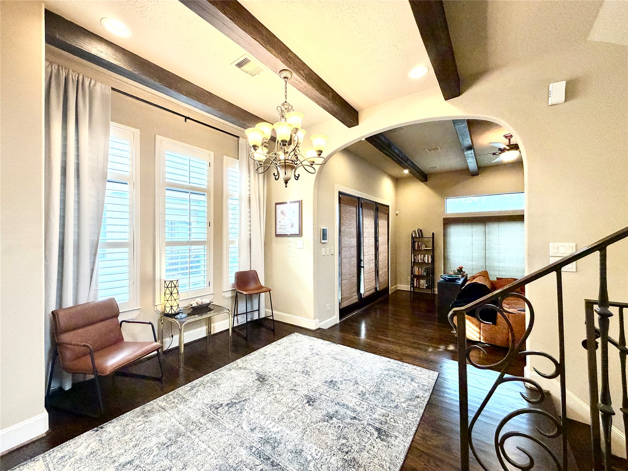 508 Knox Street Houston, TX 77007 - Photo 10 of 25 a living room with furniture and a chandelier