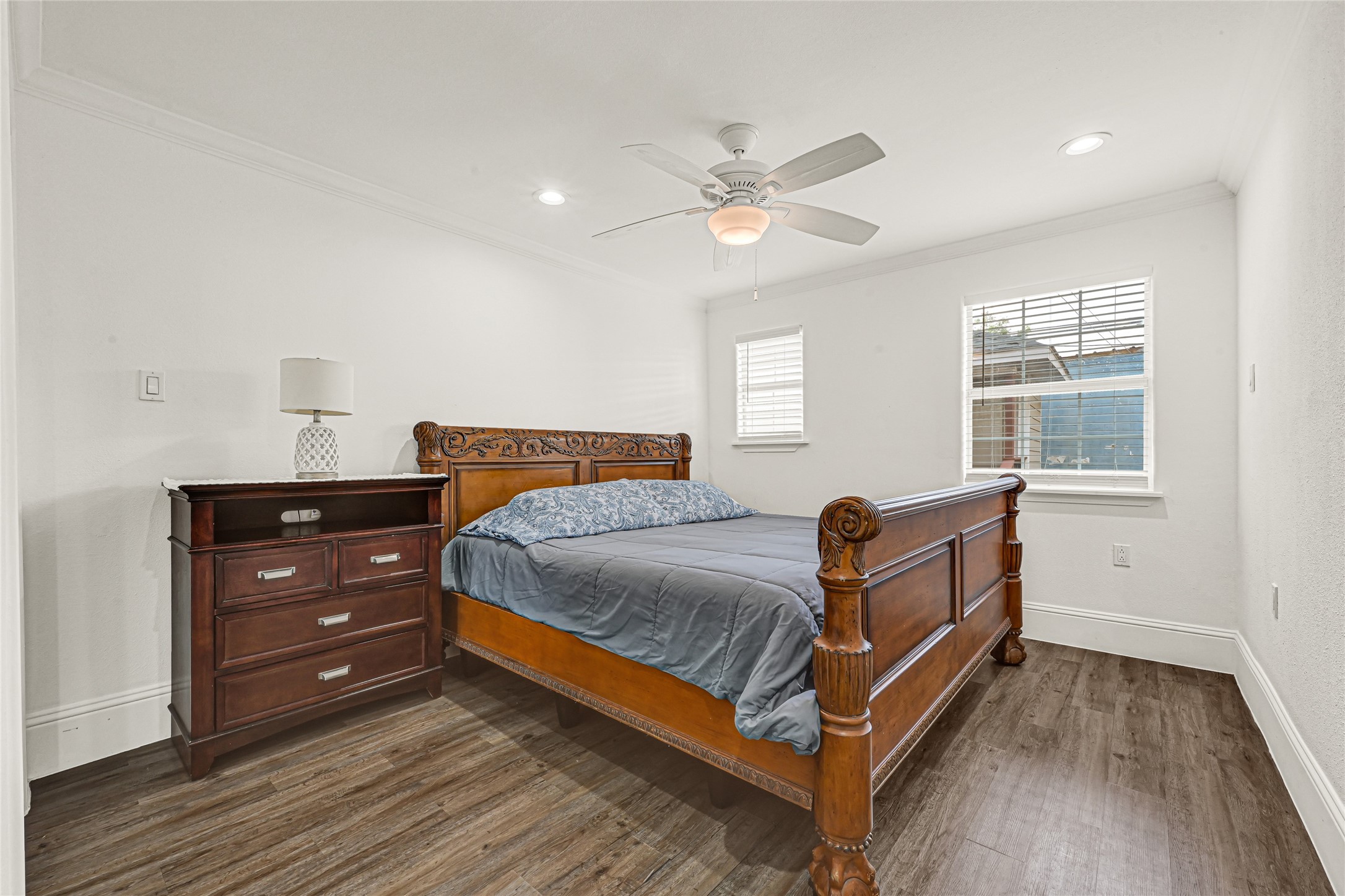 2809 Tooke Street, Unit B Houston, TX 77023 - Photo 6 of 15 Spacious bedroom with ceiling fan and great natural lighting