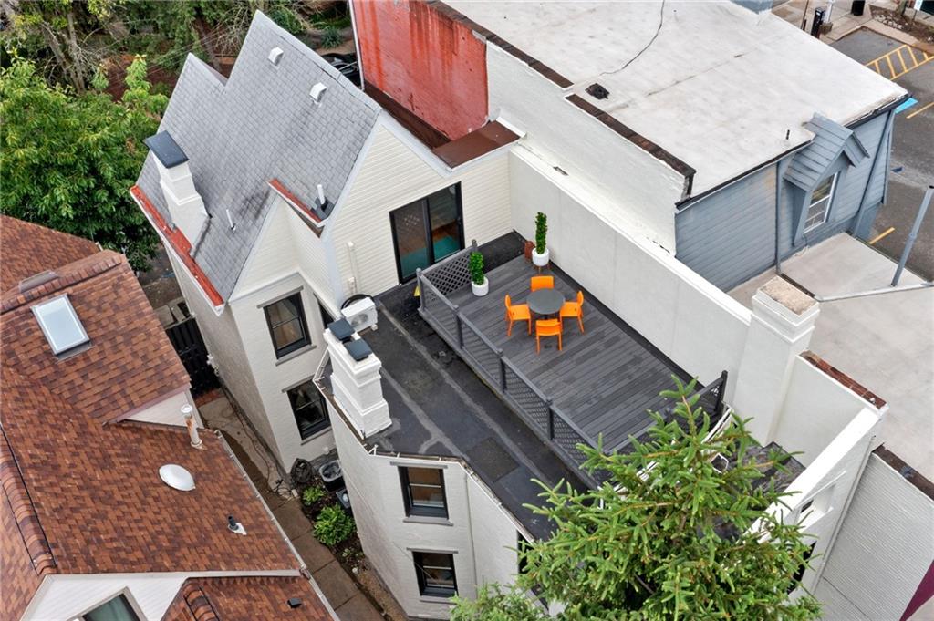 720 Ivy Street Pittsburgh, PA 15232 - Photo 2 of 50 an aerial view of a house with a yard
