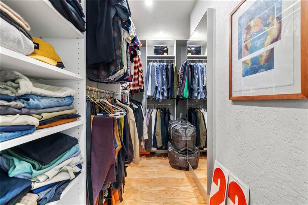 720 Ivy Street Pittsburgh, PA 15232 - Photo 35 of 50 a view of walk in closet with clothes and shoes