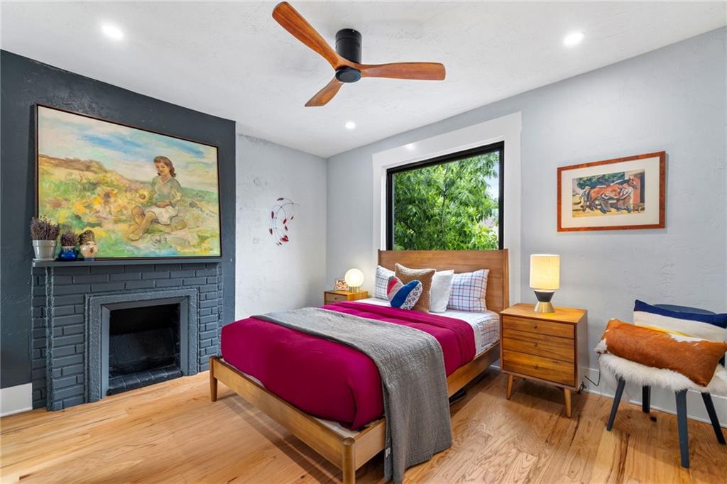 720 Ivy Street Pittsburgh, PA 15232 - Photo 38 of 50 a bed room with a bed and a fireplace