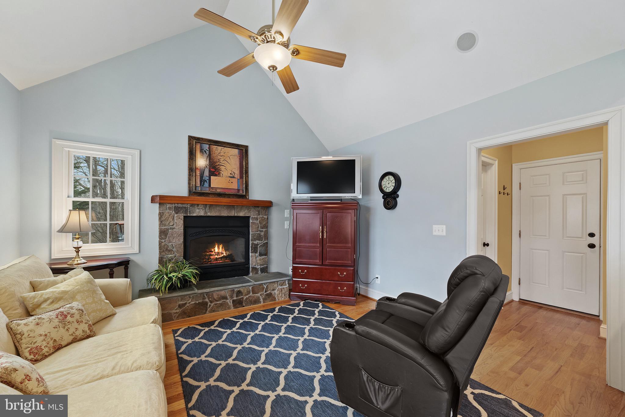 5462 Free State Road Marshall, VA 20115 - Photo 11 of 58 a living room with furniture and a fireplace