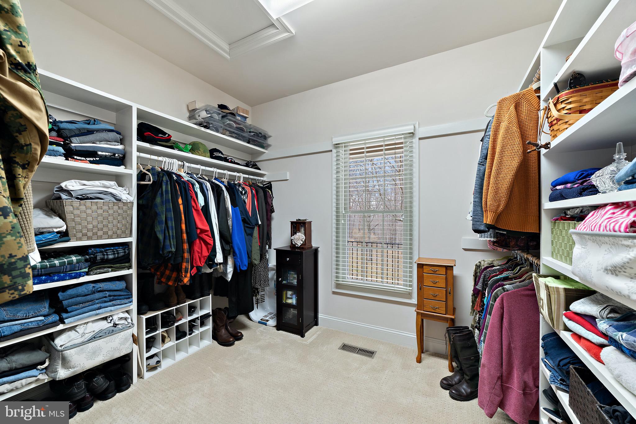 5462 Free State Road Marshall, VA 20115 - Photo 20 of 58 a view of walk in closet with clothes and shoes