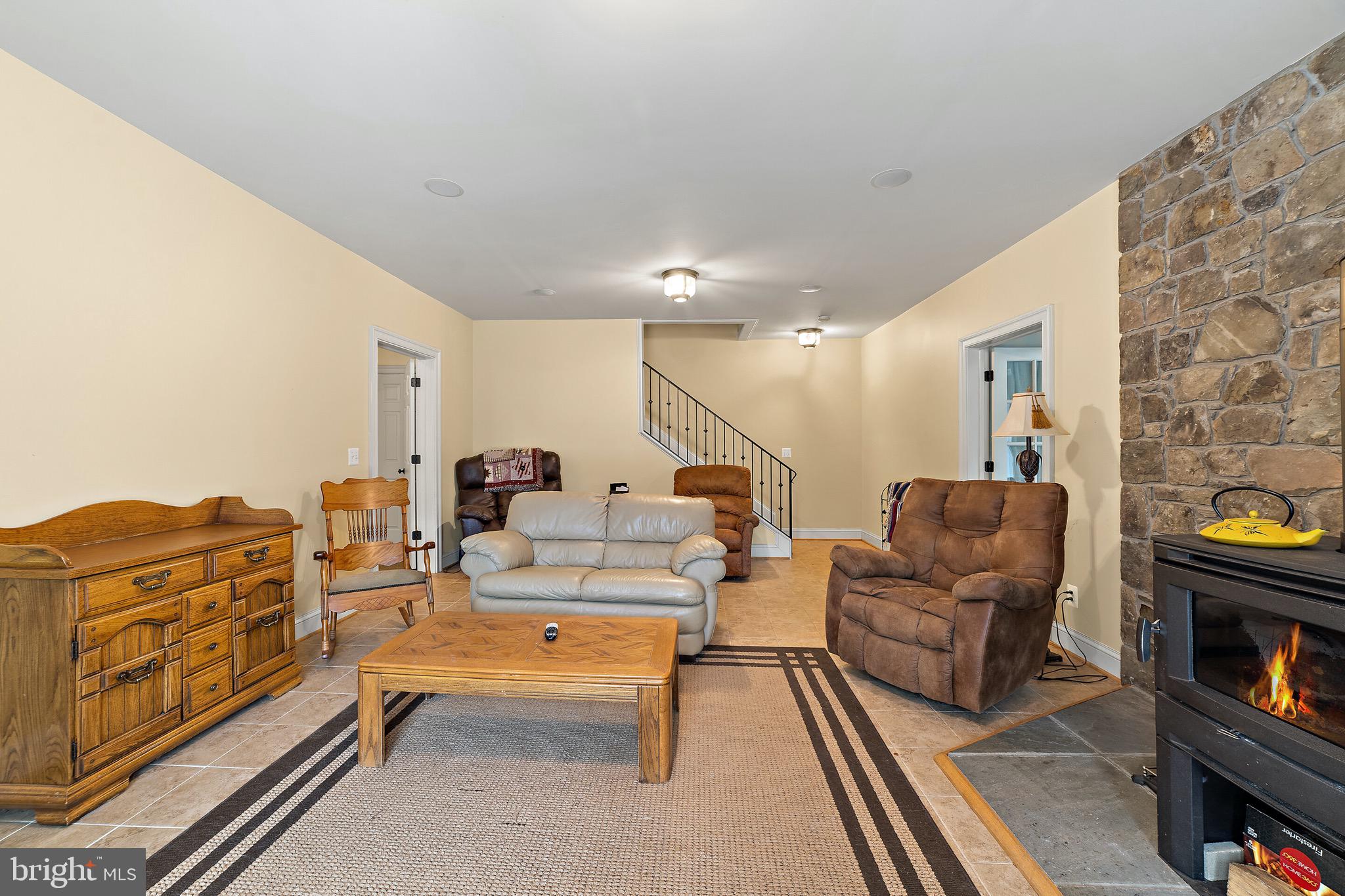 5462 Free State Road Marshall, VA 20115 - Photo 26 of 58 a living room with furniture fireplace and a flat screen tv