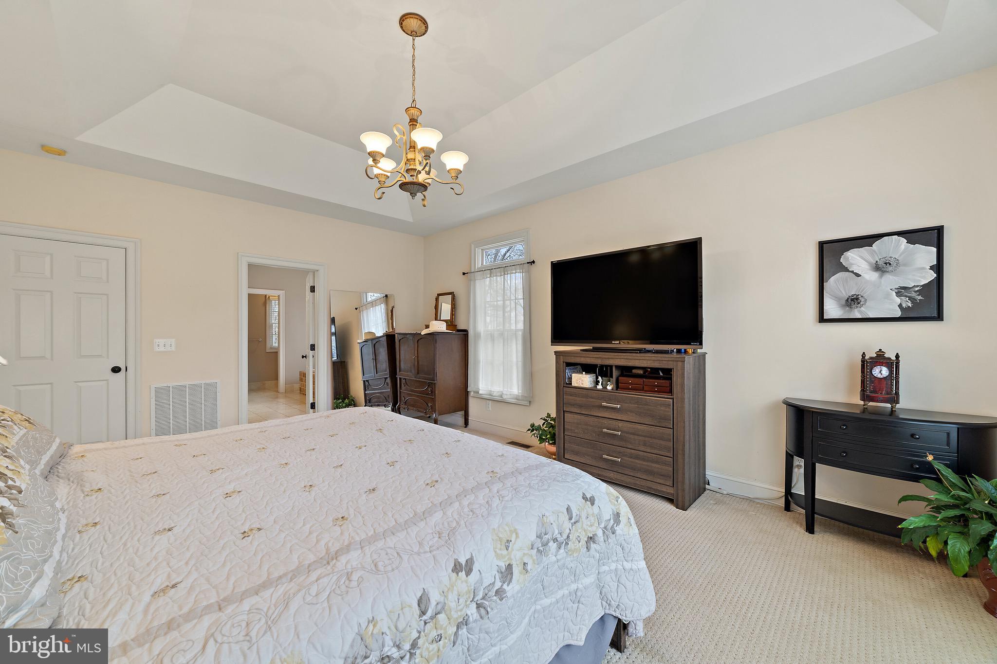 5462 Free State Road Marshall, VA 20115 - Photo 39 of 58 a bedroom with a bed and a flat screen tv in it