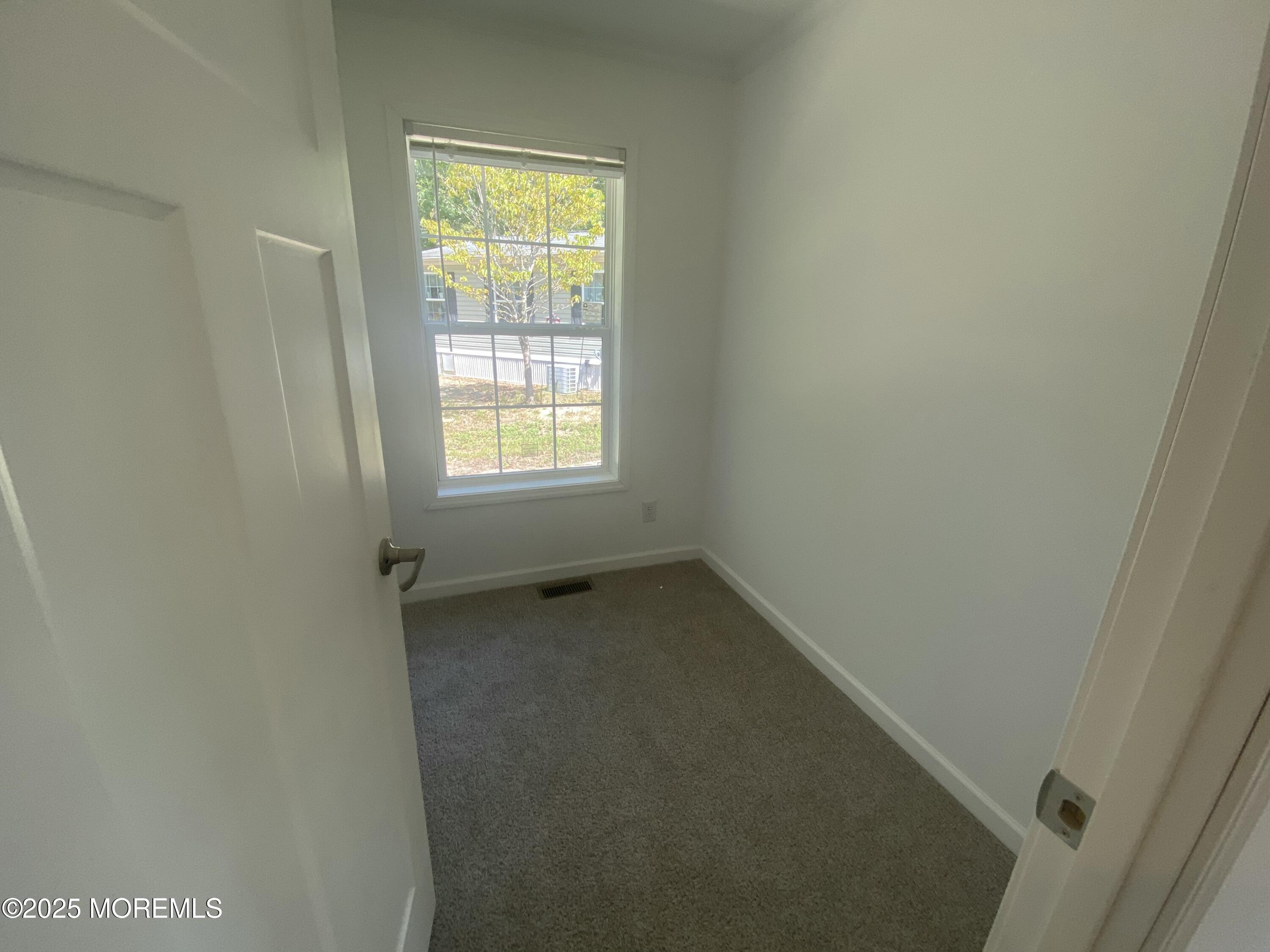 18 Maple Tree Court Manahawkin, NJ 08050 - Photo 19 of 21 a small space with a window