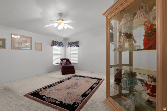 2600 North Hill Field Road, Unit 134 Layton, UT 84041 - Photo 17 of 41 Sitting room featuring ceiling fan and carpet flooring