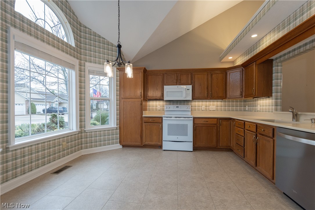 4902 Foote Road, Unit 14 Medina, OH 44256 - Photo 3 of 42 High ceilings in the kitchen make the room feel grand.