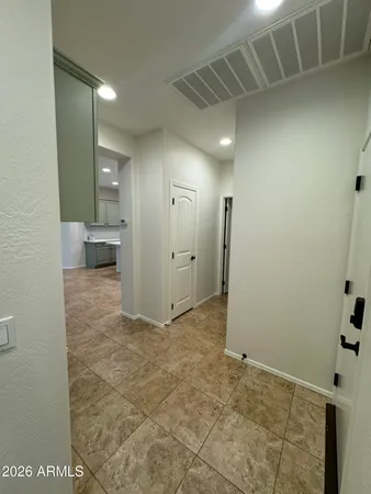 a view of storage and utility room with washer and dryer