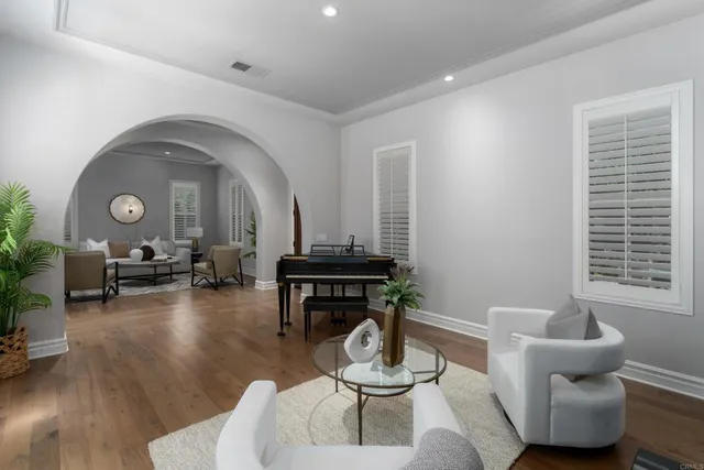 a work room with furniture and a window