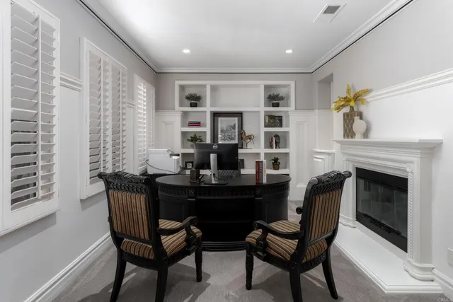 a bedroom with bed and window