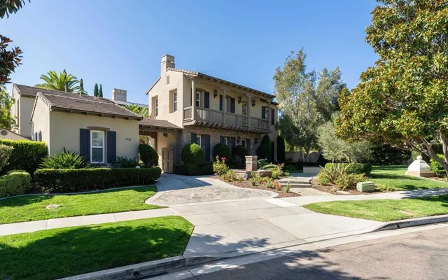 a view of a houses with a city street