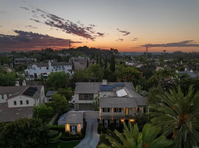 a front view of a building with garden