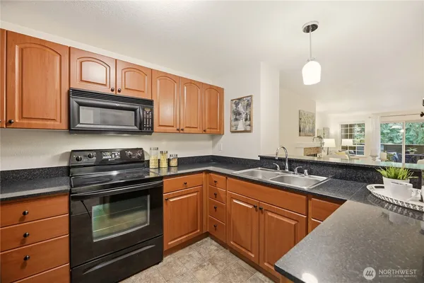 $325,000 | 15433 Country Club Drive, Unit F211, Mill Creek, WA 98012