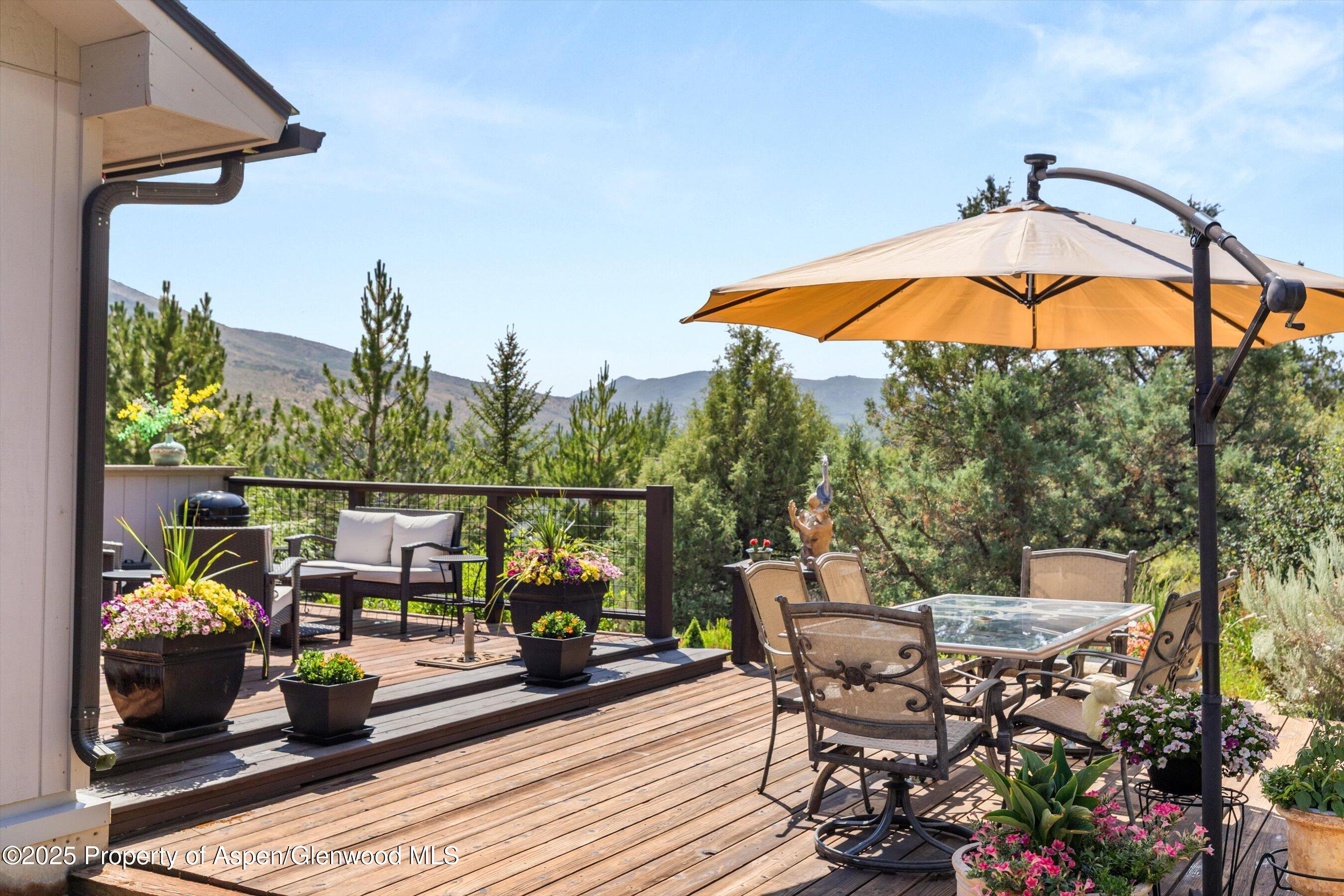 148 Gateway Road Snowmass, CO 81654 - Photo 27 of 32 an outdoor living space with furniture and city view
