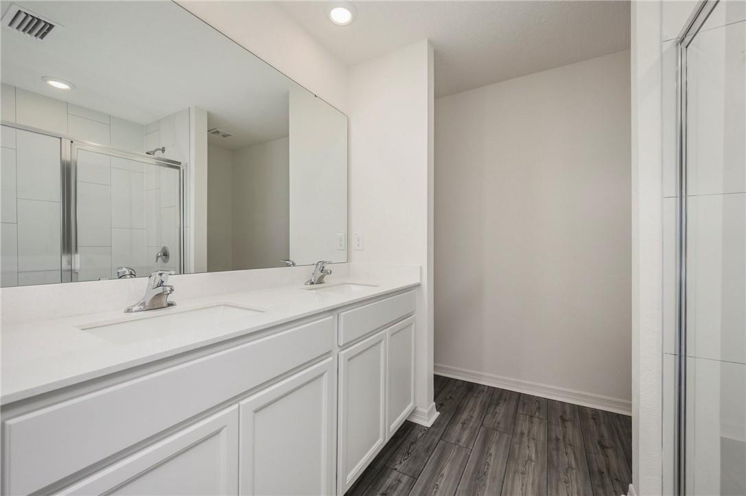 5600 Imagination Drive Fort Pierce, FL 34947 - Photo 13 of 21 a bathroom with a sink and a mirror