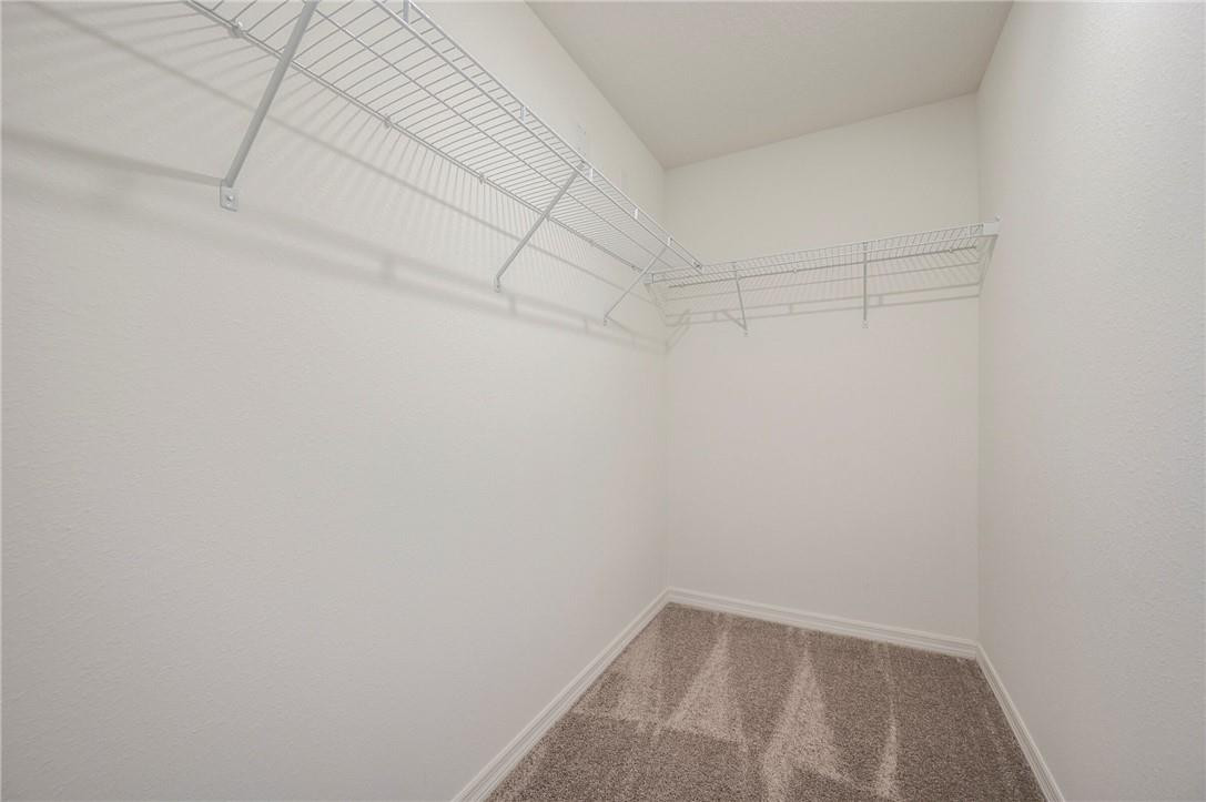5600 Imagination Drive Fort Pierce, FL 34947 - Photo 14 of 21 a view of a room with racks on the wall
