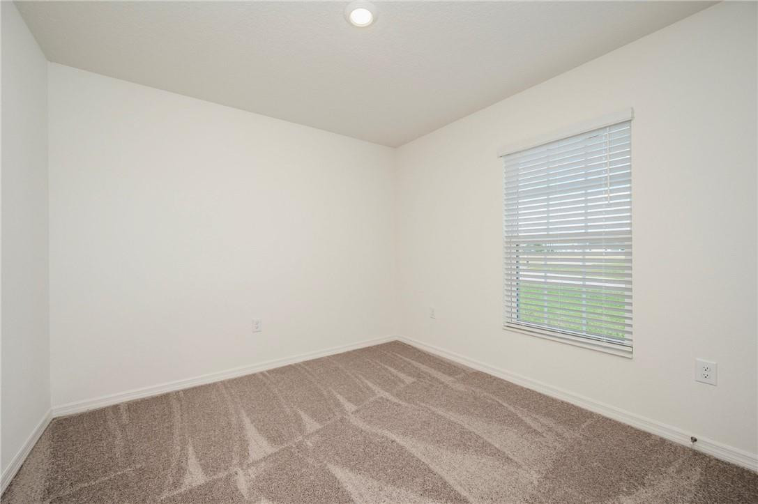5600 Imagination Drive Fort Pierce, FL 34947 - Photo 15 of 21 an empty room with a window