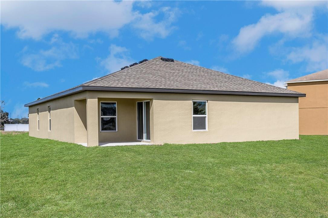5600 Imagination Drive Fort Pierce, FL 34947 - Photo 21 of 21 a front view of house with yard